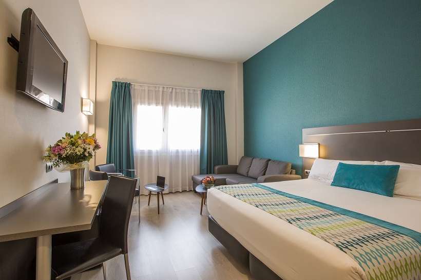 Quarto premium com cama confortável